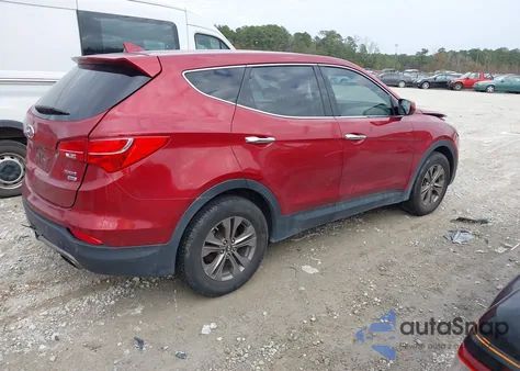 2014 Hyundai Santa Fe Sport 2.4L z USA, uszkodzony, nr VIN 5XYZTDLB9EG176243